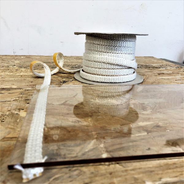 Replacing stove glass for wood burner with self-adhesive gasket